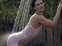 Superb girls loves to pose naughty in her wet and sexy outdoor solo