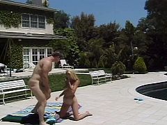After giving a short interview, Holly Halston meets her sex partner and have a hot fuck by the pool. He slides his cock deep in her trimmed pussy while the camera is on.