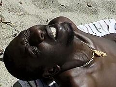 After sucking her man's hard rod of black meat under the sun at the beach, this intense ebony belle gets he hairy black pussy rammed into a superbly hot orgasm.