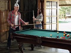 This stupid dumb fucker is wearing a tin foil hat, to protect his brain from aliens, but that won't stop him for having sex. He fucks her from behind, against the billiard table and then, kisses her cute butt.