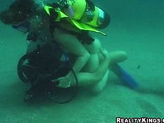 This nasty woman loves to have sex in amazing places. This time she fucks on the seabed. She sucks a dick and then gets fucked deep in her pussy.