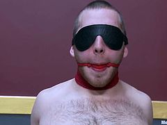This dude with big dick gets tied up by another man. Then he gets humiliated and toyed with a vibrator.