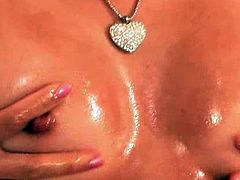 Stephanie massages oil all over her hot body..making sure to not miss any parts. She pays special attention to all the important parts...rubbing her nice perky breasts, extremely hard nipples, tight little pussy and round ass. Very sexual and sensual video with Stephanie, you do not want to miss.