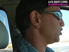 Handsome guy picks up fat slut at the parking lot. He finds out that she doesn't mind making porn video. So he takes her to the studio where he tit fucks her hard.