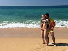 Slim blonde hottie and her BF are having a good time on a beach. They kiss and pet each other passionately and then have fantastic anal sex in the reverse cowgirl and other positions.