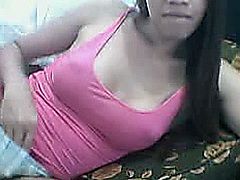 Asian tranny masturbating her hard cock.Horny tranny ladyboy grabs her big hard cock with her hands. She jerks off her dick and play it in her live tranny cam show. Asian tranny with nice huge set of rack gives you a nice show as he jerks his erect penis.