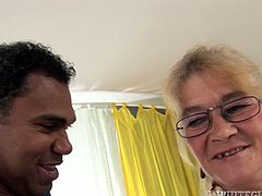 This sex-starved granny is a natural born cock sucker. She takes a massive, black cock in her filthy mouth and sucks it passionately like there's no tomorrow.