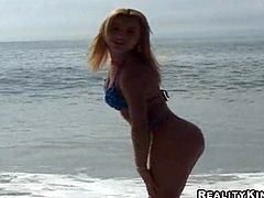 Get a load of this hardcore scene where a sexy Brazilian blonde's fucked silly on the beach as the camera records the entire action.