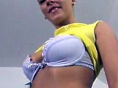 Cute slim blonde Vivienne is having a good time alone. She strips in front of a cam and demonstrates her beautiful tits and cute butt.