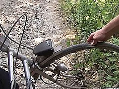 Sexy brunette biker girl Terry gives blowjob and gets fucked in the woods