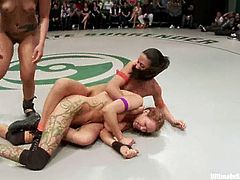 Groups of nude girls wrestle in a ring showing good martial arts skills. They also finger each others pussies in the heat of the battle.