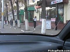 Hot brunette strolling the European streets is asked by horny guys if she'd be willing to suck cock for cash and she eagerly agrees and goes to the park bench and gets on her knees and gets down to business.