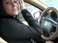Pretty brunette chick gives a ride to some guy. She gets seduced by him, so she gives him a blowjob in the car in the middle of the day.
