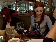 Submissive redhead babe has a dinner with two chicks. After that they play some bondage games. Justine gets tied up and toyed with the strap-on.