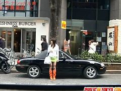 This Japanese chick gets fingered on the street. The action continues at home, when she takes cock in her hairy snatch.