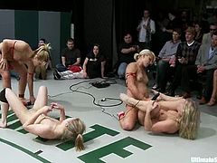 Horny nude sluts Dia Zerva, Jessie Cox, Tara Lynn Foxx and Vendetta are having a tussle on tatami. They wrestle with each other and then play with strapons crazily.
