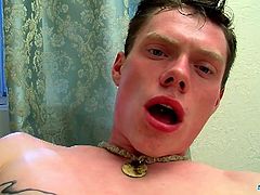 Inked hot stud Aaron Manson jerks out his cum load in his own face and licks it up! He is looking at the camera and wants someone to suck his rod like a lolli!