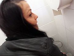Amateur chick Kristyna is screwed doggy style in a public toilet for money