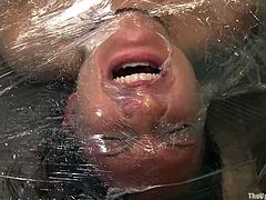 Kinky Rain DeGrey gets humiliated by Sophie Monroe. Rain gets tied up and then wrapped. Later on she fingered and clothespinned.