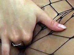 Blindfolded brunette fingers wet pussy in solo. Her delicious body covered with fishnet makes her sexier than ever and pleasuring herself is what she wants to do.
