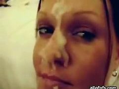 Filthy hoe gets her pretty face messed up in jizz after intensive handjob