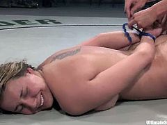 Delilah Strong is not strong enough, so she loses a fight to Vendetta. She sucks a strap-on passionately and then gets her vagina drilled from behind.