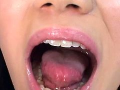 Sweet japanese babe moans by having her sexy mouth filled with juicy cream