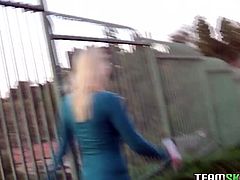 Funky blonde bitch in tight leggings walks on a rocky road and exposes her perky tits on camera. Gal pulls her pants half way down showing off her round butt.