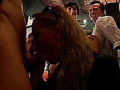 Excited club bitches sucking and fucking hard cocks in public