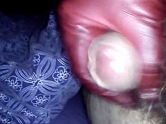 Jerking my small cock with red leather gloves in bed