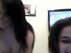 Kinky brunette chick with perky tits sit topless in front of camera. One of the girls gets on laps of her lover and they start kissing passionately. Damn, I'd love to bang these chicks at once.