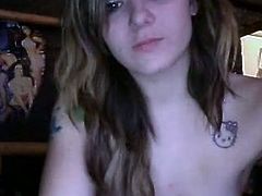 Frisky girl with pretty face and perky tits is sitting topless in front of webcam. She then kneads her tits sensually. Alluring amateur babe in exciting solo homemade video.