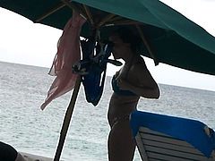 Spying on a curvy teen bikini babe