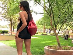 Take a look at this beautiful brunette's amazing body as she walks round the street wearing a sexy dress. Watch her flashing her tits and showing off her perfect ass.