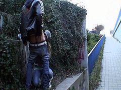 This European bitch pees by the railway and takes cock from behind while two people passing by film her. Then, they move to another place where she blows him and gets fucked again.