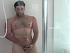 Handsome straight guy Johnny masturbating his enormous phallus in the shower