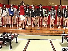 Japanese female employees go on a hot springs retreat with a group of rowdy fans along with a vermilion jacket clad gregarious host who instructs them to strip bottomless in order to play a truly embarrassing game of pass the cushion using their feet leaving them all very exposed with subtitles
