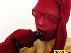 Barra Brass is a horny blonde slut with glasses and she wants to satisfy her nylon fetishes. Watch her spreading legs in red nylons and using her dildo to cum.