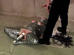 Wasteland brings you a hell of a free porn video where you can see how a hot and wild slave gets covered in duck tape and tortured by her master before he vibrates her cunt.