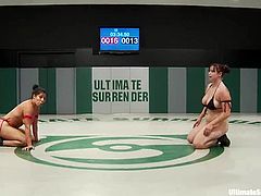 Bella Rossi and Izamar Gutierrez are having a wrestling match on tatami. The lesbians beat each other and then the loser gets her twat pounded with a dildo.