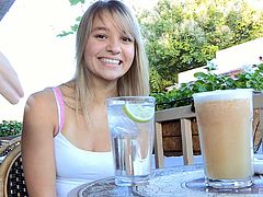 Nice blonde girl has fun at nice summer day. She has a snack and then takes her clothes off. This babe shows titties and ass by the pool.