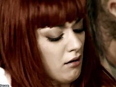 Redhead Mai Bailey with huge jugs makes no secret of her snatch and tits