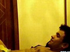 Passionate Indian couple is having steamy foreplay. The guy goes down on his girl. Then he thrusts his dick in her mouth so she sucks deepthroat.
