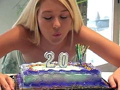 Horny Alison Angel celebrates her 20th birthday. She eats a cake and opens presents. After some time she covers her nipples with cream and then licks it off.