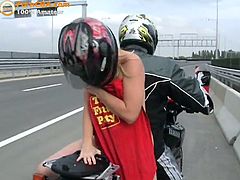 Naughty blonde strips during a kinky biked ride