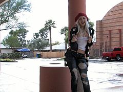Naughty Layden shows her small tits and booty in a public place. She takes off her t-shirt and bra right in the street.