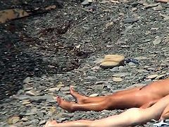 Check out beach spying on some nude ladies by horny voyeur