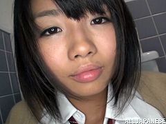 This cute Japanese babe loves to give sloppy blowjobs. Before the cock sucking begins, she must be made as horny as possible. Watch as she opens her legs, so a small vibrator can be used on her cunt. This does the trick, so she sucks her man off, while sitting on the toilet seat.