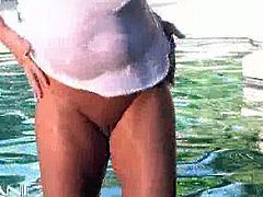 Mary Cary is a busty bombshell and she is teasing you at the pool. She rubs oil allover her big jugs and starts playing with these huge melons!