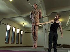 Matthews is hanging around with his executor. Oh yeah, he hags tied up tightly while the guy rubs his dick. Matthews loves to be treated like a cheap piece of meat and he enjoys every moment. Maybe after all that hard cock rubbing he will receive some spanks and something that will make him cum